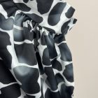 Mintás, galléros felső