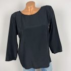 Fényes anyagú, nyitott hátú felső